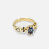 Side view of Supernova Blue Sapphire and White Diamond Ring