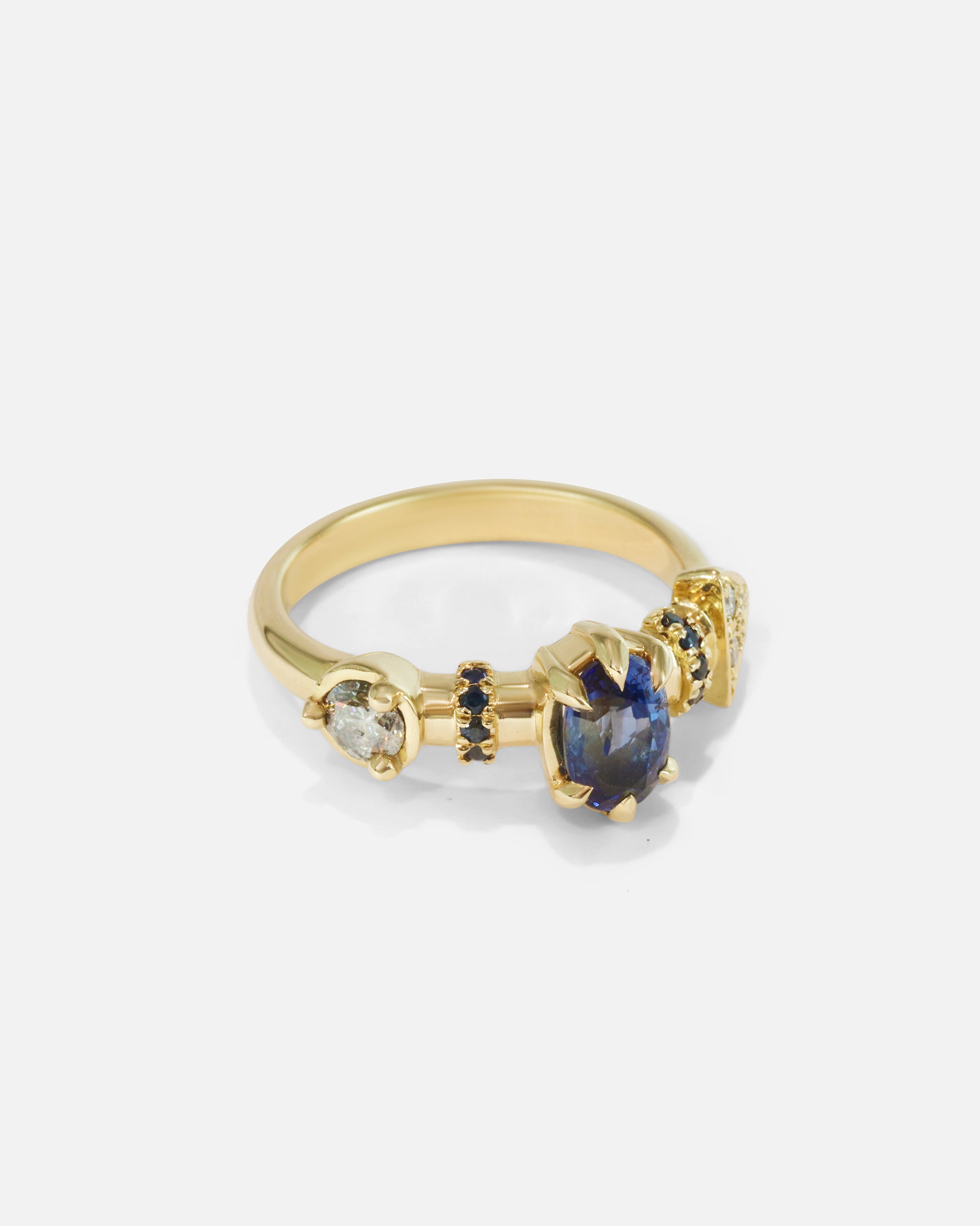 Side view of Supernova Blue Sapphire and White Diamond Ring