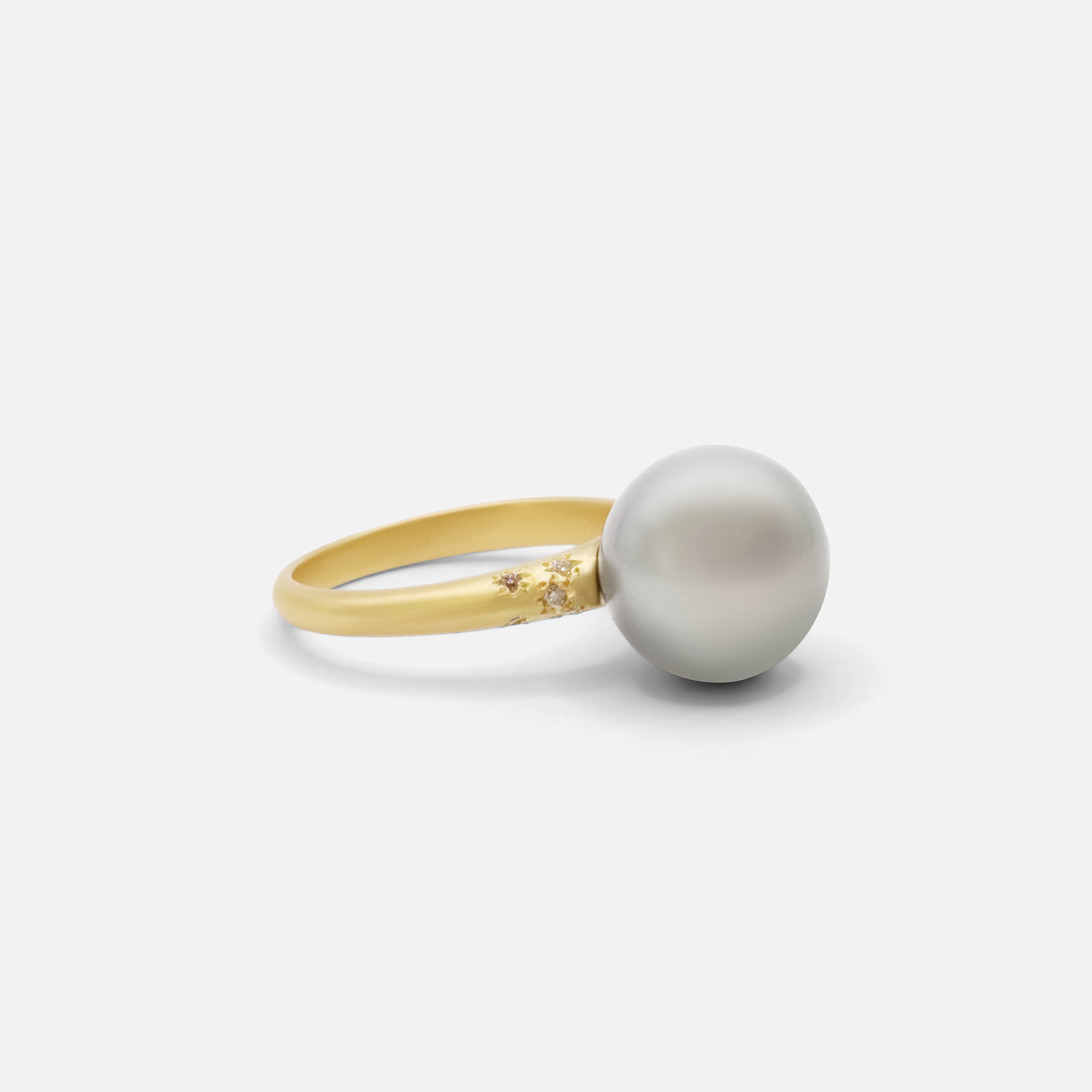 Side view of Umi / South Sea Pearl and Melee Diamond Ring