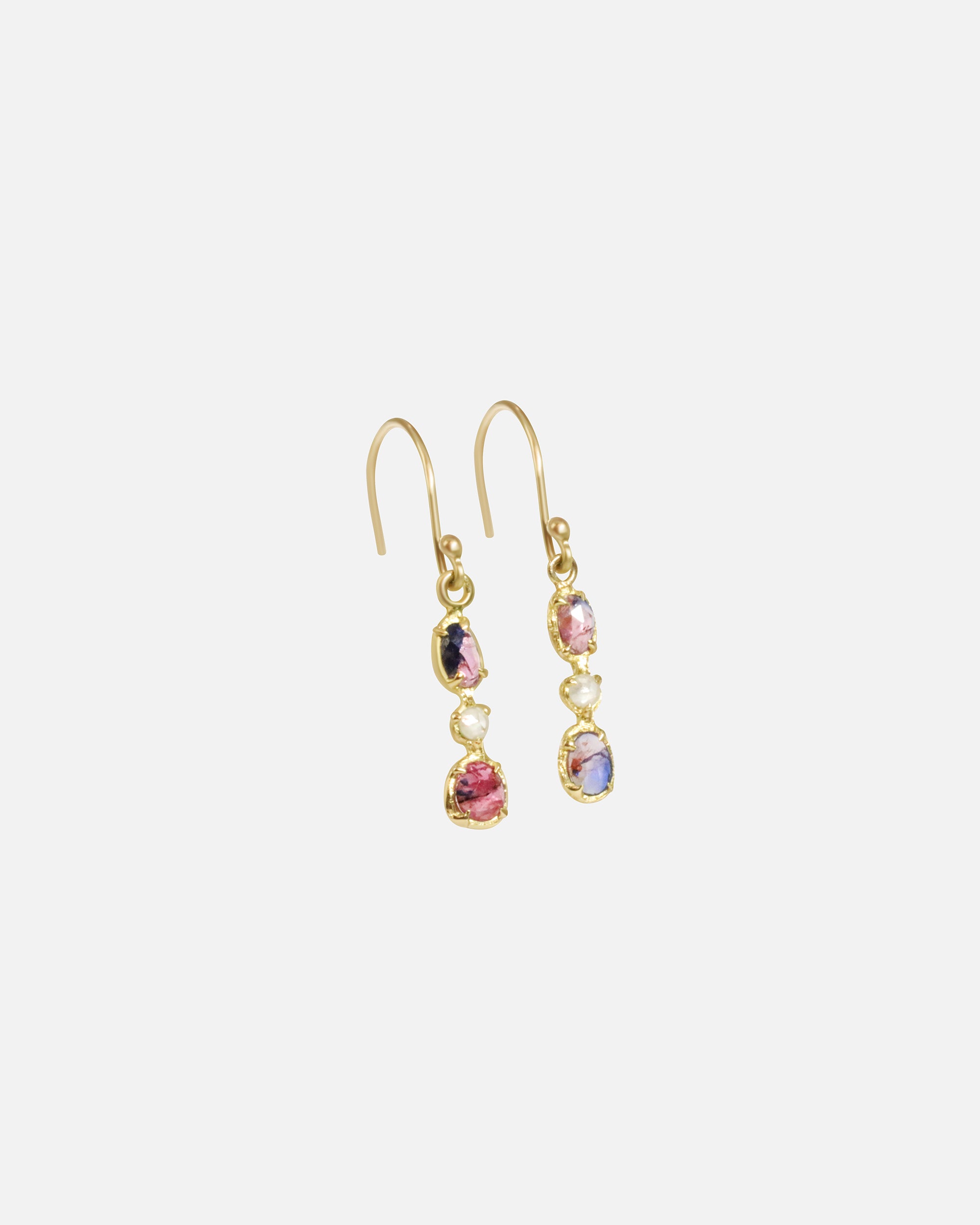 Side view of Silk / Winza Sapphire Earrings by Hiroyo