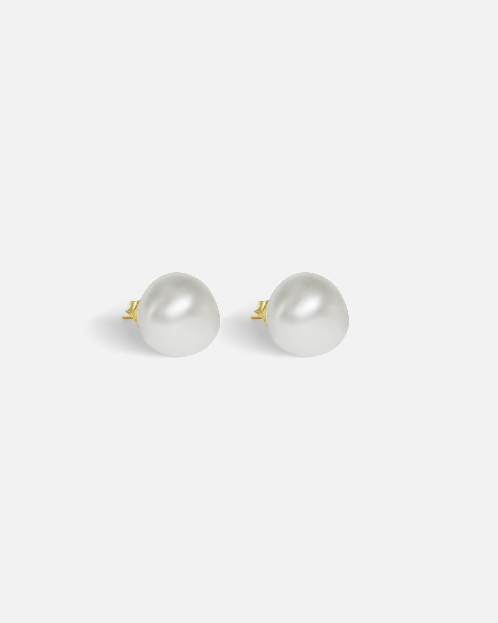 Side view of Umi / Fresh Water Pearl Studs by Hiroyo