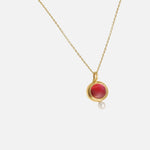 Side  view of Star Red Sapphire & Seed Pearl Pendant by Hiroyo