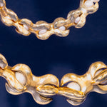 Close view of X Pearl Necklace / 6mm and  X Pearl Necklace / 3mm By Lucia B Marti