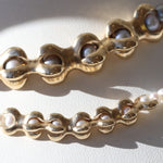 Close view of X Pearl Necklace / 6mm and  X Pearl Necklace / 3mm By Lucia B Marti