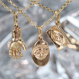 Group shout of Theia Pendant, Intagliaux Oval Pendant, and Intagliaux Pendant