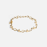 Side view of Locus Intermittendi Bracelet in 14k yellow gold By Lucia B Marti