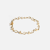 Side view of Locus Intermittendi Bracelet in 14k yellow gold By Lucia B Marti