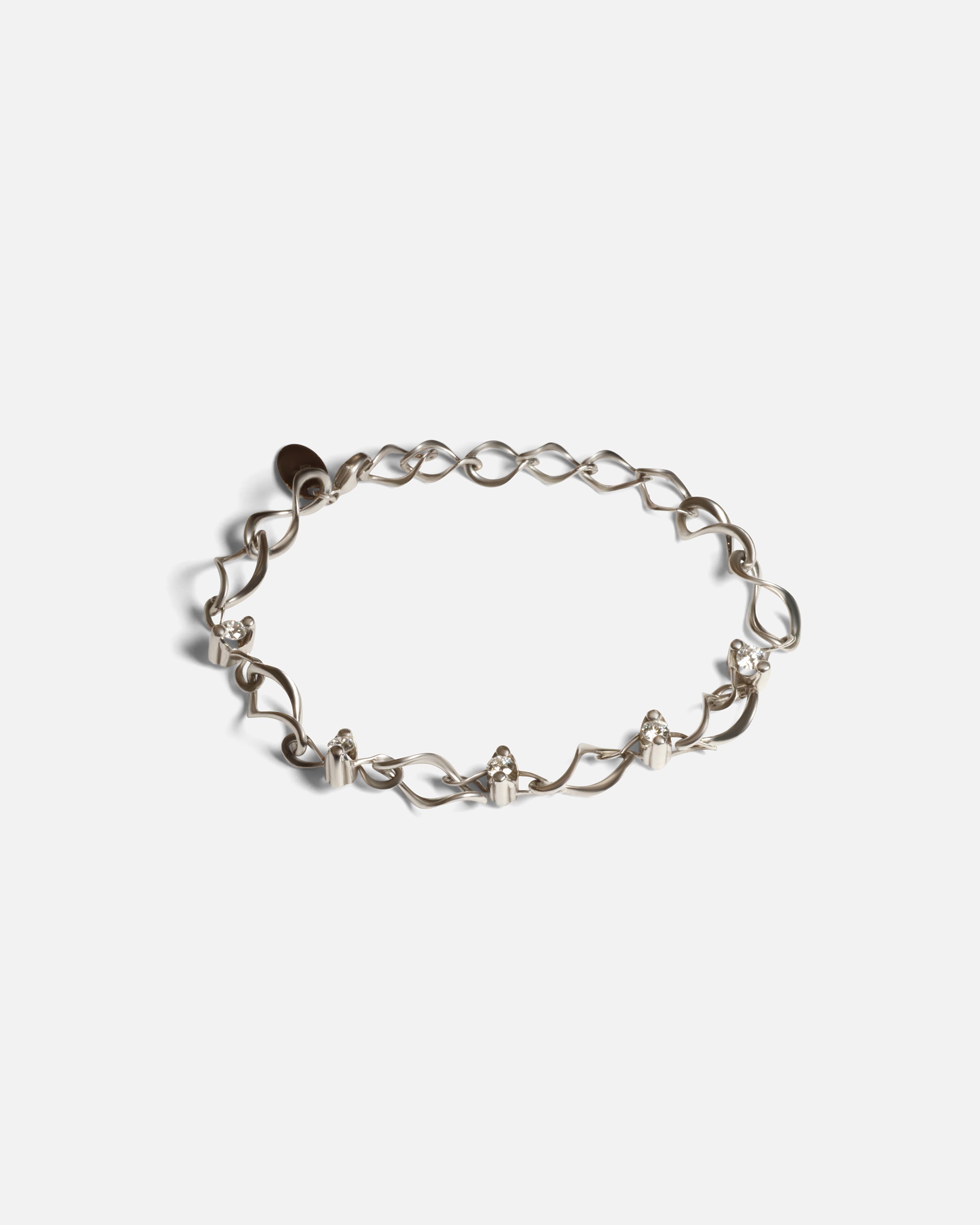 Front view of Locus Intermittendi Bracelet in 14k white gold By Lucia B Marti