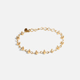 Side view of Locus Intermittendi Bracelet	in 14k yellow gold by Lucia B Marti