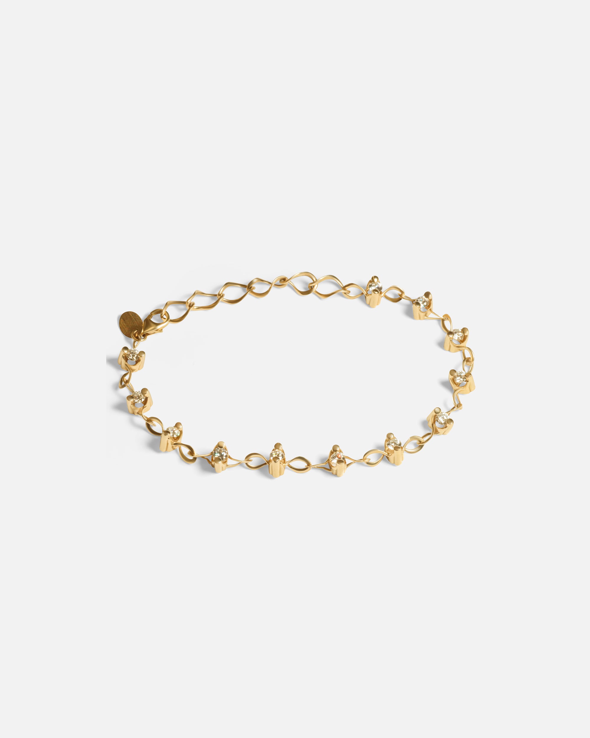 Front view of Locus Intermittendi Bracelet	in 14k yellow gold by Lucia B Marti