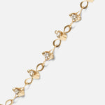 Close up view of Locus Intermittendi Bracelet	in 14k yellow gold by Lucia B Marti