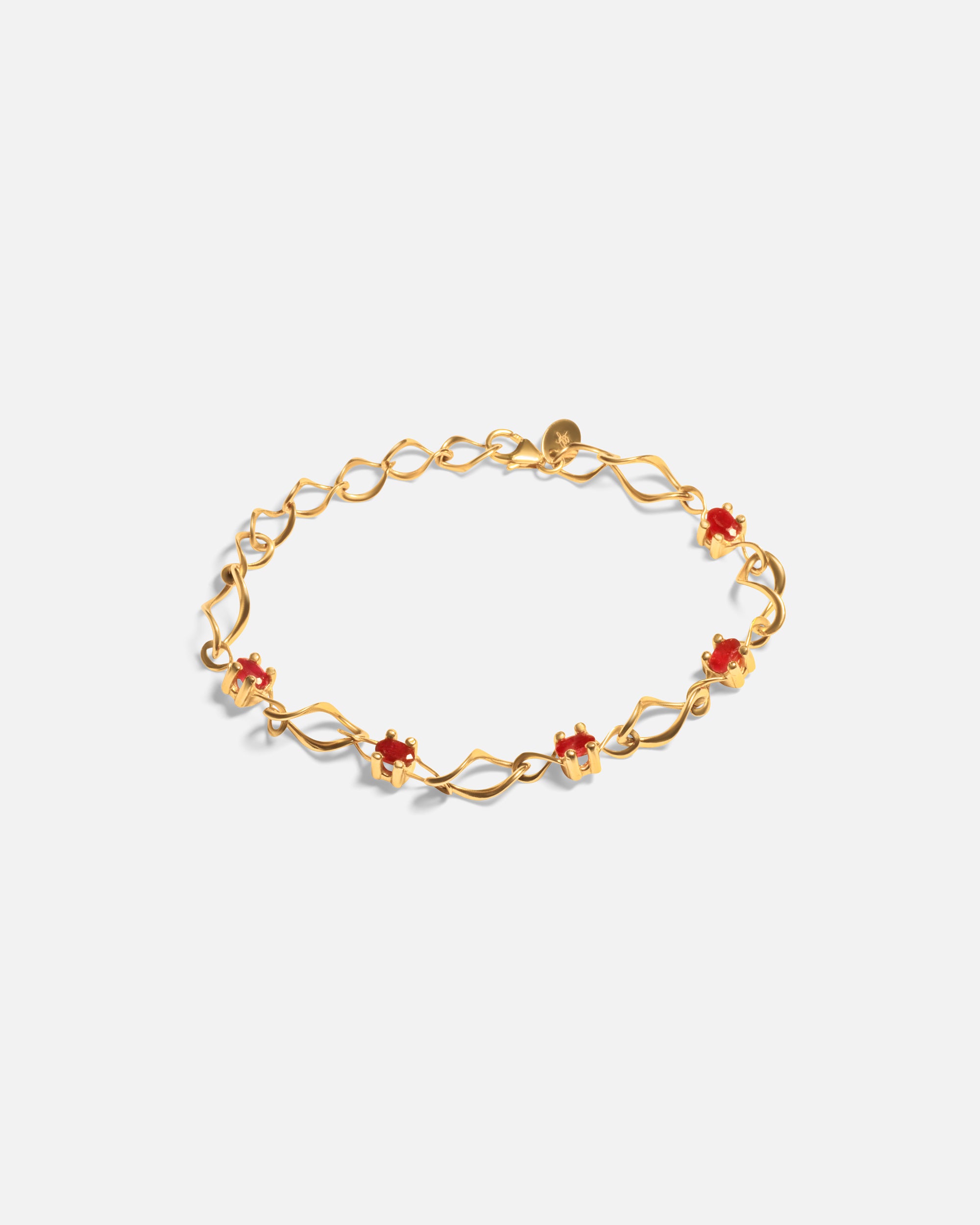 Front view of Nucleus Intermittendi Bracelet / Ruby in 14k yellow gold by Lucia B Marti