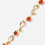 Close view of Nucleus Intermittendi Bracelet / Ruby in 14k yellow gold by Lucia B Marti