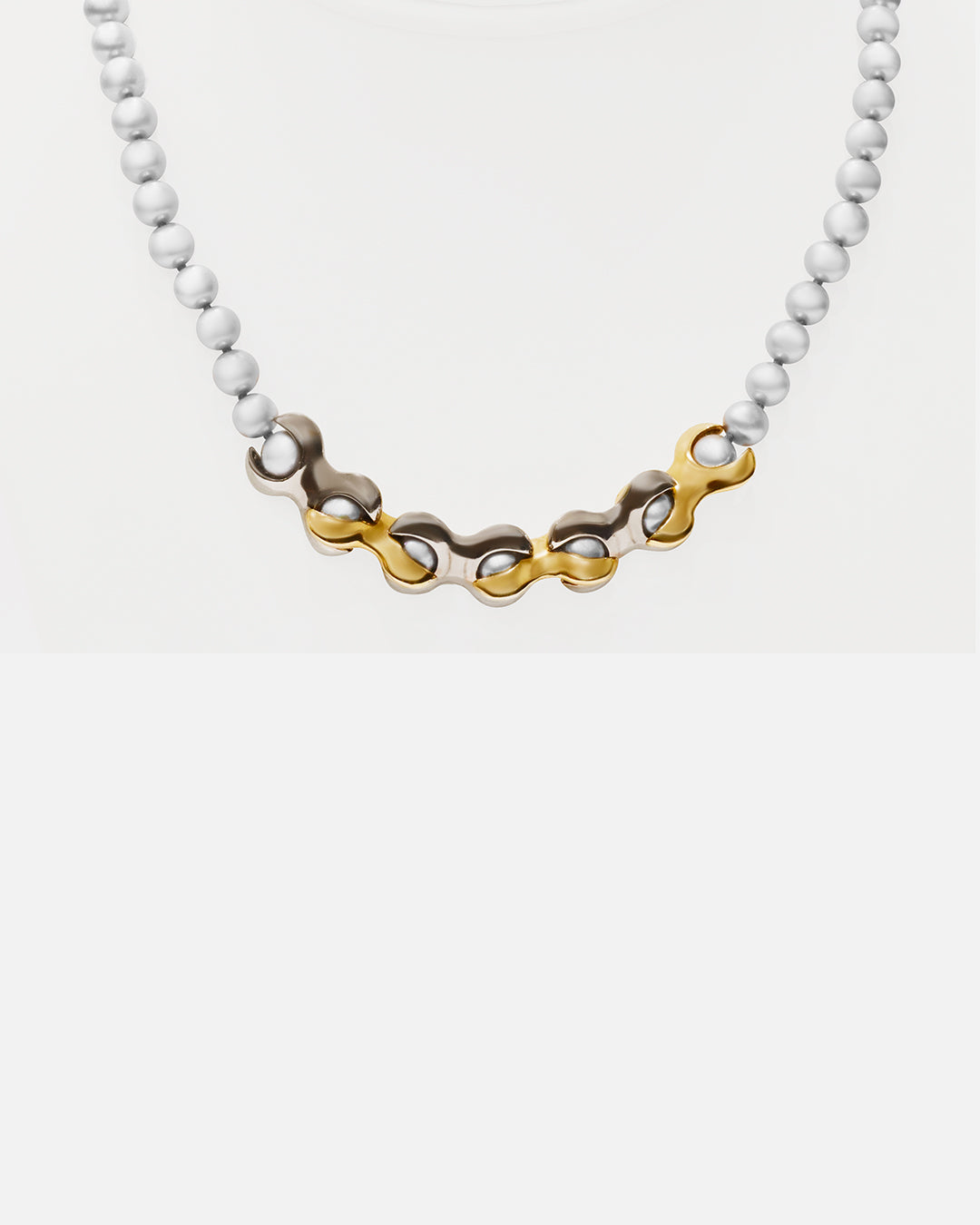 Front view of X Pearl Necklace / 6mm in 14k yellow gold and 14k white gold by Lucia B Marti