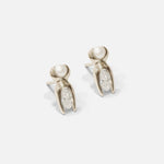 Side view of Mutation Earrings / White Gold by Lucia B Marti