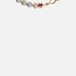 Close view of X Nucleus Chain Pearl Necklace / Ruby by Lucia B Marti