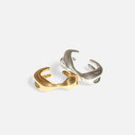 Group shot of X Earcuff by Lucia B Marti in 14k yellow gold and 14k white gold