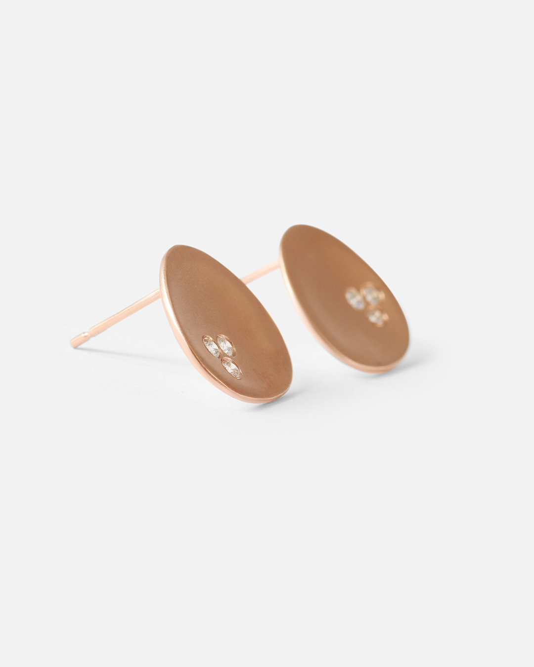 Side view of Leaf / Rose Gold + Diamond Studs By Hiroyo