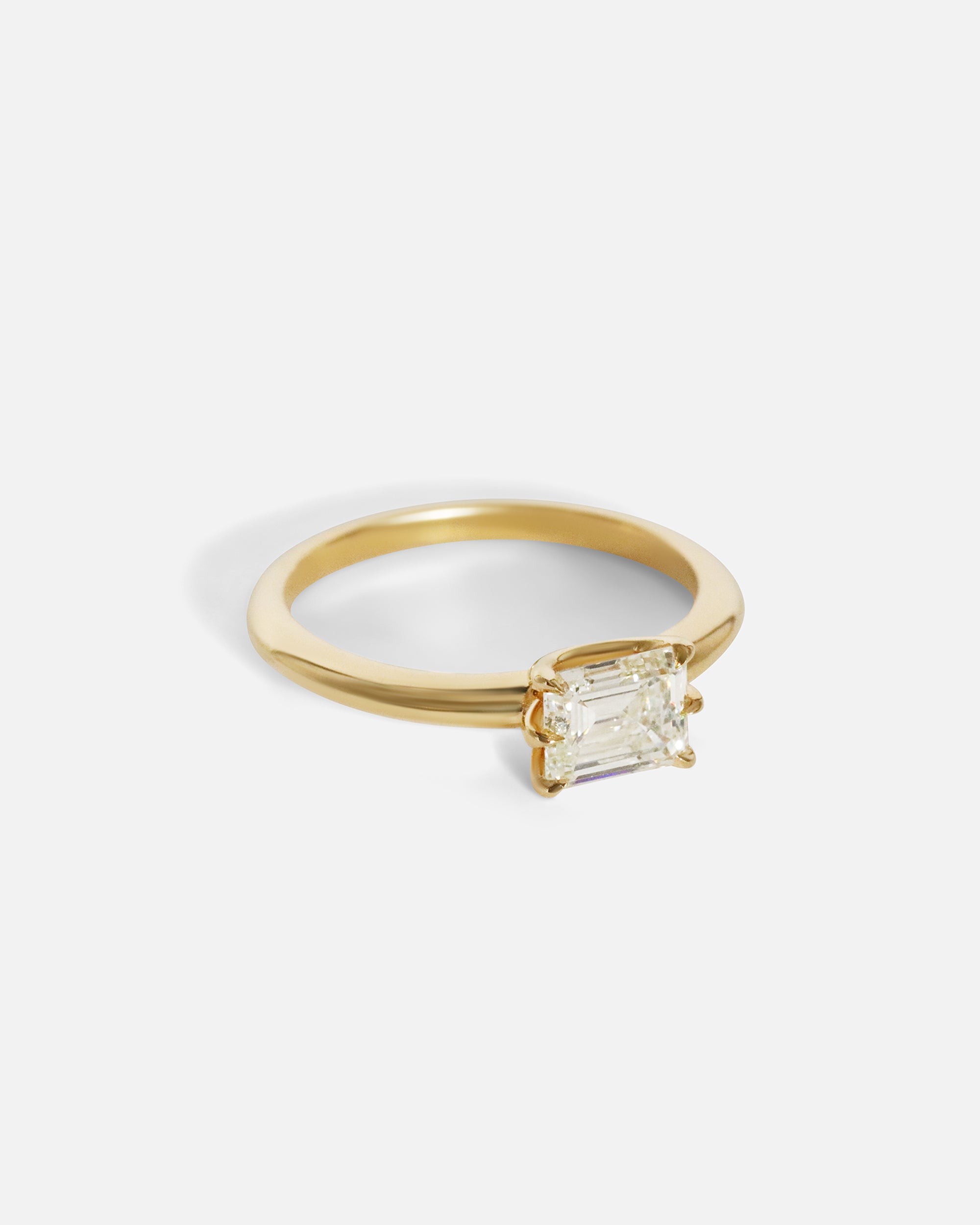 Side view of Emerald Cut Six Prong Diamond Ring by Nishi