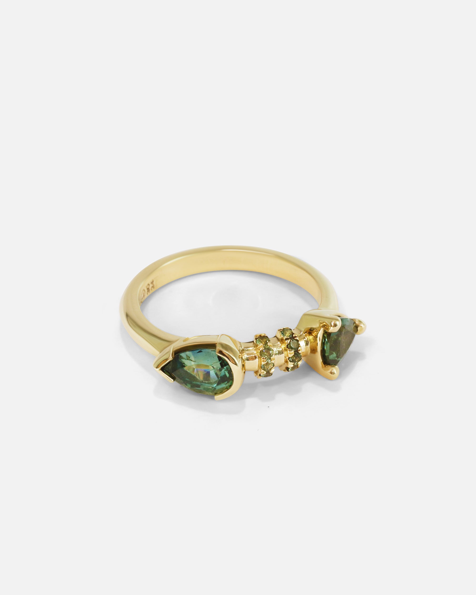 Side view of Calabash Nebula Teal Sapphire Ring