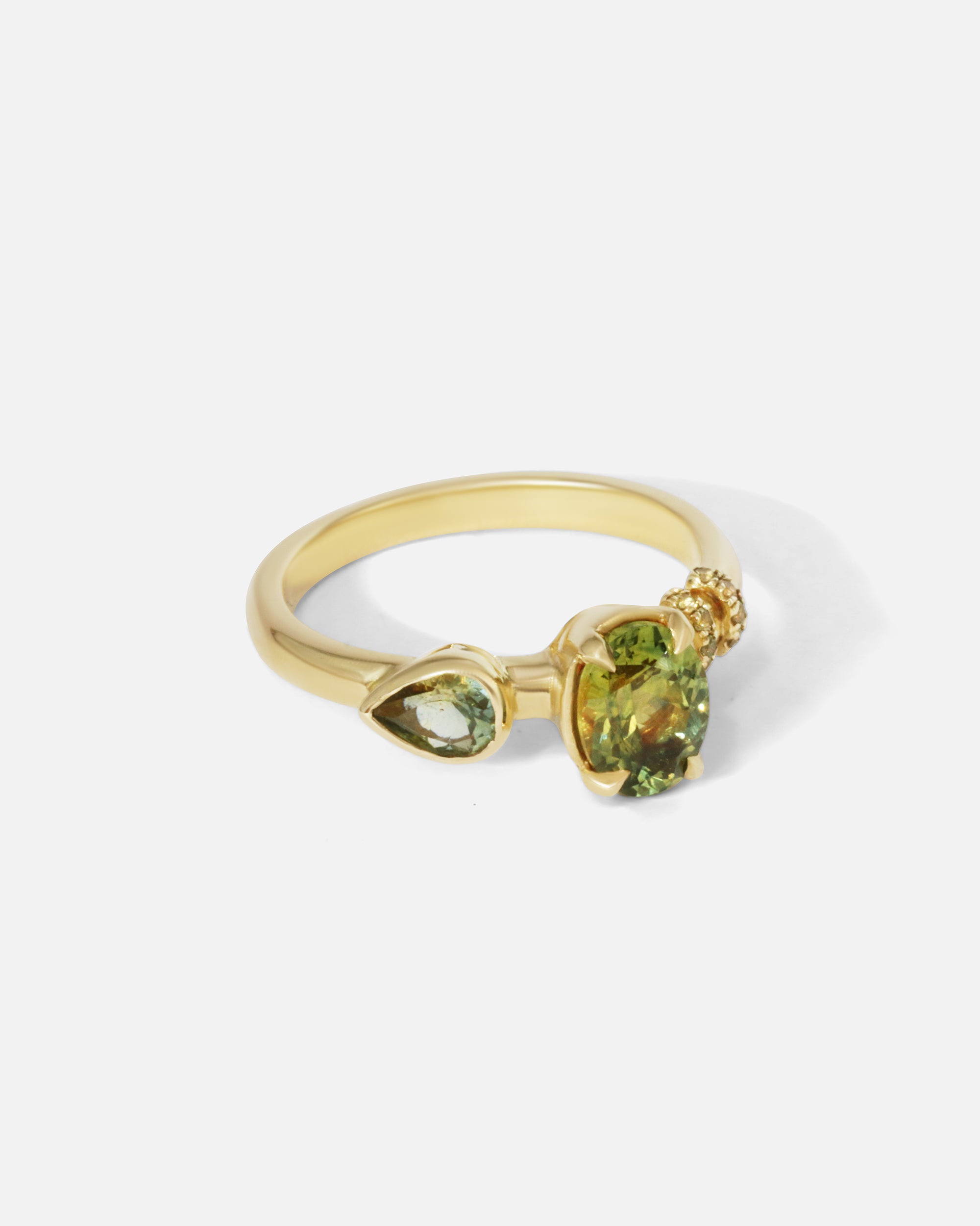 Side view of Monoceros Nebula Green Pear Sapphire Ring